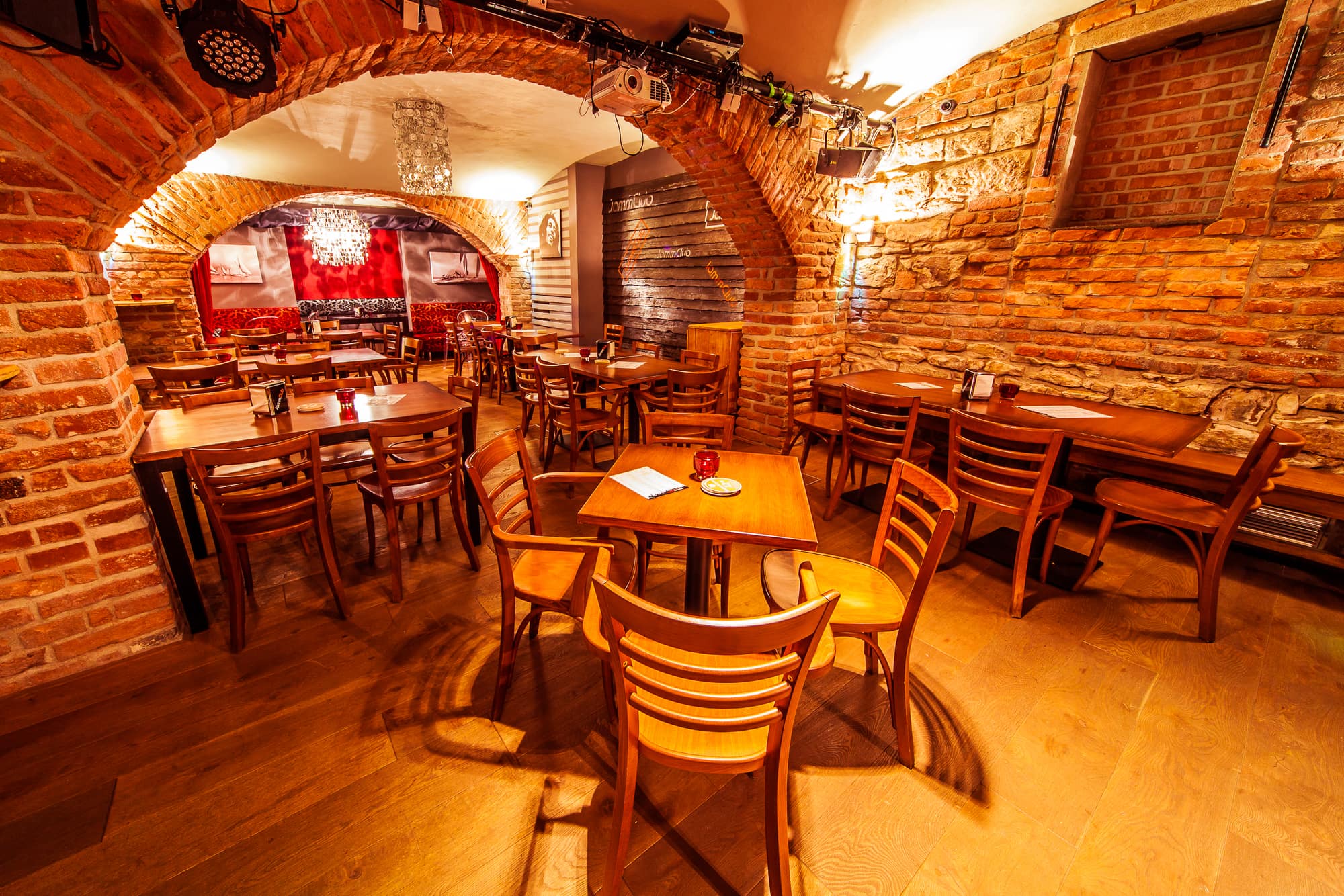 Main hall of JammClub with brick arches